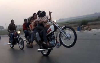 Behold, The One-Handed, Five-Man Motorcycle Wheelie
