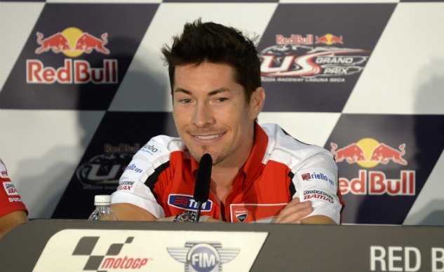 a with nicky hayden inside dainese d store at indy motogp