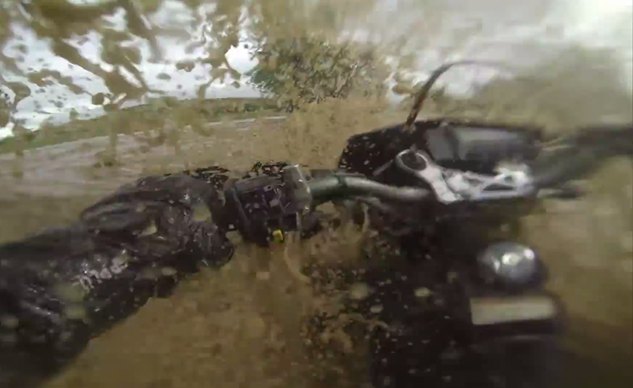 motorcyclist attempts to cross flash flood video