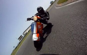 Vespa Rider Dragging Knee Chasing A Supermoto – Video