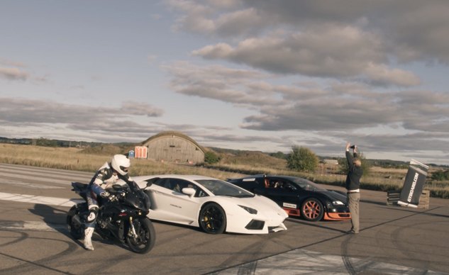 bmw s1000rr takes on ultimate supercars video