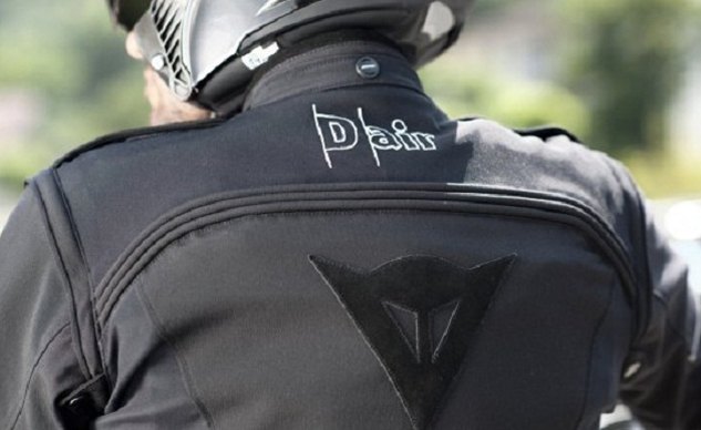 dainese and peugeot scooters together for enhanced safety