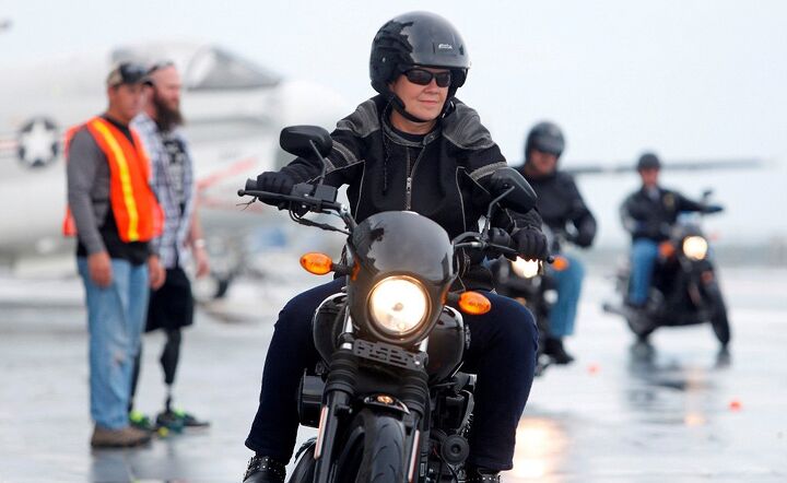 harley davidson offers free riding academy to all u s military, Debi Cole from James Island S C rides the H D Street 500 aboard the USS Yorktown in Mt Pleasant S C Mic Smith AP Images for Harley Davidson