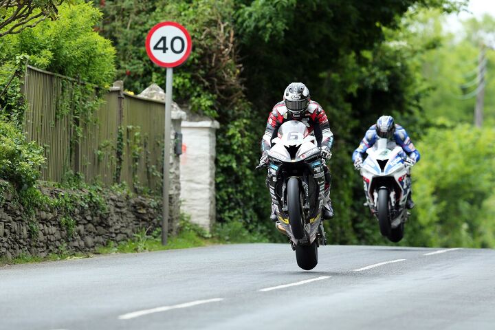2016 isle of man tt rst superbike tt, Michael Dunlop and Ian Hutchinson take flight in the RST Superbike TT Photo by IOMTT com