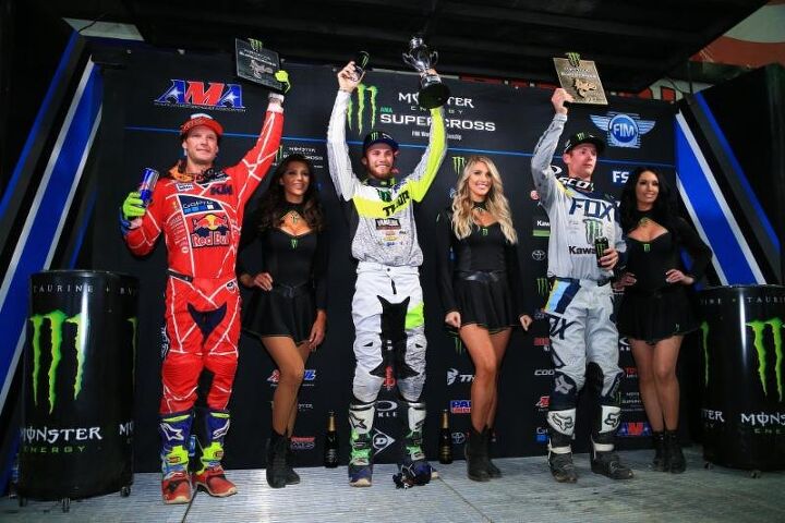 eli tomac wins second consecutive monster energy supercross in glendale, Aaron Plessinger celebrates his second Western Regional 250SX Class win on the podium with Shane McElrath and Adam Cianciarulo Photo credit Feld Entertainment Inc