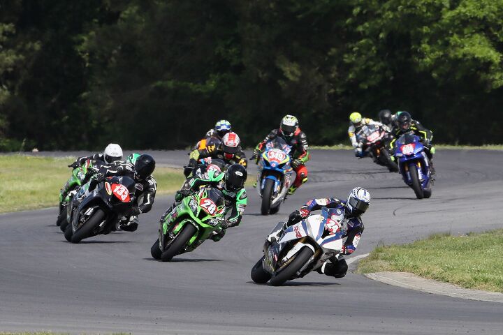 elias and beach dominate at virginia international raceway, BMW mounted Travis Wyman 24 won his second Stock 1000 race in as many starts with his victory over Andrew Lee hidden and Samuel Smathers 133 Shane Richardson 28 ended up fourth Photo by Brian J Nelson