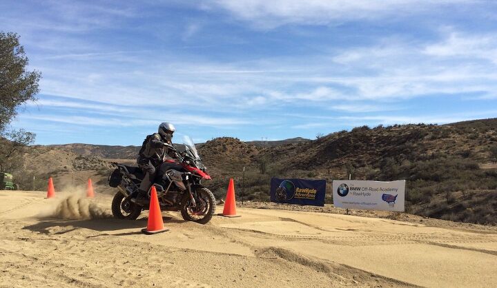 rawhyde adventures expands its off road motorcycle training operations, A student at RawHyde s California training center practices riding through sand