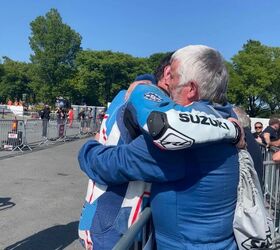 Shaun Anderson and his father Howard embrace after his emotional top ten finish and 130 MPH lap in the Superbike Race. Photo by Sarah Anderson @sarahanderson.photography