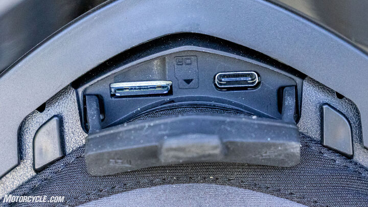 The USB-C charging port is on the right, and the easy-to-remove microSD card is on the left. All of it is protected under a rubber cap.