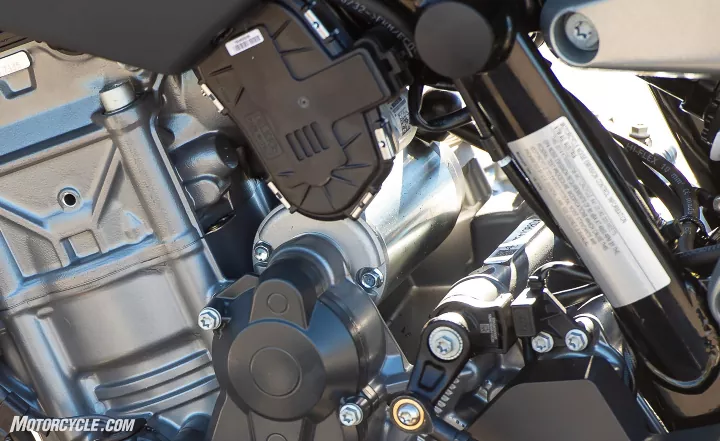 church of mo 2019 ktm 790 duke review first ride, The ride by wire throttle bodies are hidden behind the black plastic cover The starter motor looks huge next to this compact engine