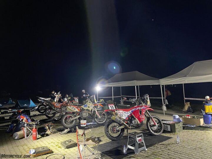 Typical night of a rally racer in Malle Moto category - servicing the bike at night before the 3-4 hours of sleep.