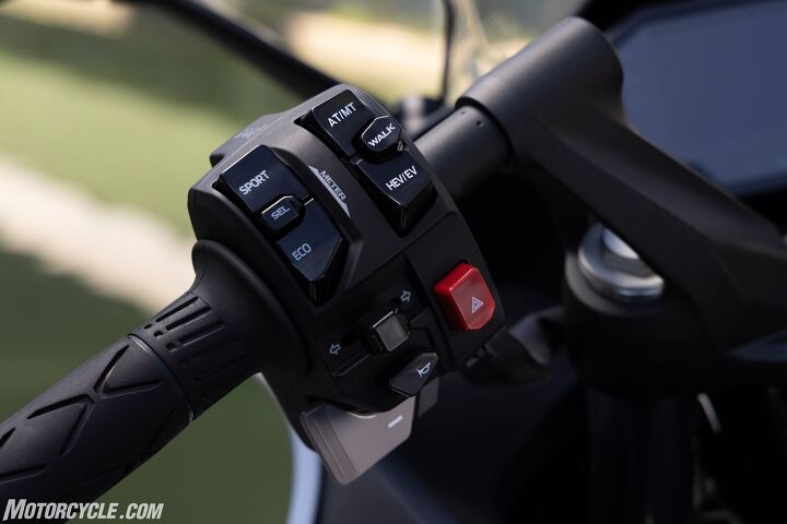 Nearly all of the Ninja 7’s functions start from the left bar. Here you can select Hybrid or pure EV power, automatic or manual shifting, Walk Mode, or Sport or Eco ride modes. The paddle below the horn button displays a “-” symbol for manual downshifts, while on the front of the panel, a corresponding “+” paddle is used for upshifts.