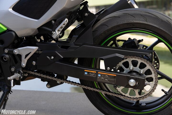 The Ninja 7 gets a longer swingarm compared to the Ninja 400 to avoid any interference with the battery, which is located here in between the two passenger pegs. The shock linkage is also slightly different, too. For the tire geeks out there, note the Thai-made Dunlop Q5A tire for the European road market, not to be confused for the track-focused, US-made Q5 and Q5S for the American market.
