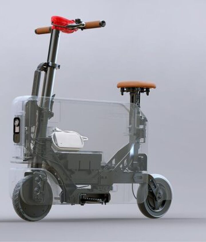 This X-Ray view details how simple the Motocompacto is. You have the battery in the middle, the controller in front, and the motor in the front wheel. The charge port is underneath the headlight and there’s a carrying handle attached to the main steering tube. You can see the charger inside the void where the seat and bars reside when folded up.