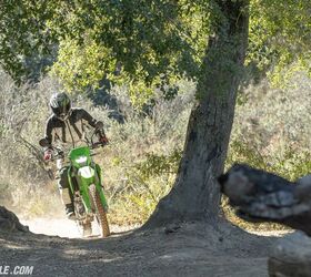 Thanks to how small and light the KLX is, finding your way through trails and between tree stumps is an easy affair.