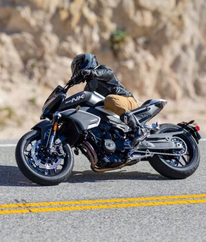 The bars help leverage the 800NK into corners, and assuming the pavement is smooth, the bike tracks nicely through it.