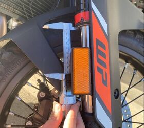 Measuring the fork to check how much of the travel is used under heavy braking. KTM provides o-rings on the inner fork tubes so you can easily see how much of the suspension you’re using.