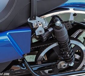 Quick disconnect fasteners for the saddlebags make them easy to take on and off, giving you access to the shocks. The big news is the rear suspension now has three inches of travel. There’s no adjustability other than the ability to change preload via the knob.