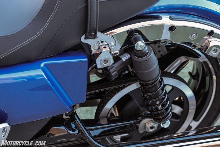 Quick disconnect fasteners for the saddlebags make them easy to take on and off, giving you access to the shocks. The big news is the rear suspension now has three inches of travel. There’s no adjustability other than the ability to change preload via the knob.