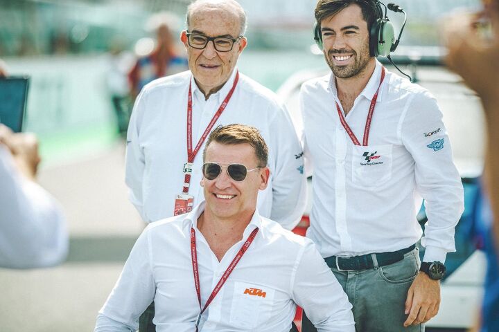 Dorna’s Carmelo Ezpeleta (rear left) with Carlos Ezpeleta (rear right) and KTM Motorsport Director Pit Beirer (front).