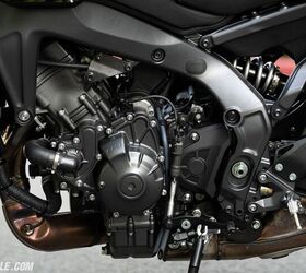 The 890 engine hasn’t changed from before, but some of its supporting cast has. The latest generation of Yamaha’s quickshifter now allows greater flexibility, and the engine mount you see is a little thicker. A returning feature is the adjustable peg position, as seen by the exposed threaded holes above the footpeg bracket.