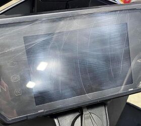 Before the application of the protective film, the scratches are prominent and it’s hard to see the screen.