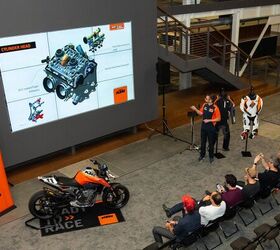 The KTM 790 Duke's original US launch. Is it a coincidence the slide they're looking at is of the cylinder head? Photo by Simon Cudby.