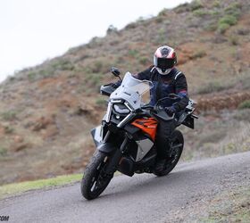 The KTM Super Adventure S EVO is a cozy place to call home, offering ample legroom with slightly lowered footpegs than before and a comfortable reach to the multi-position handlebar. Between the adjustable windscreen and 6-gallon fuel tank, the elements don’t pose a threat. There is no denying it's tall with the 33.34-inch seat in its low position, though narrow V-Twin packaging allows my 32-inch inseam to reach terra firma.