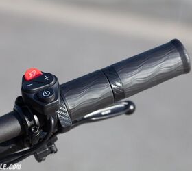 Unlike a motorcycle, the throttle on the Flux X26 is the inner half of the split grip. The outer half stays stationary. When you’re at full throttle, a tap of the red button activates Boost Mode for a little extra oomph for 10 seconds. The +/- buttons let you scroll through the dash display, and the power button, well, you know what that does.