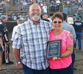 Dennis Pearson and Sherry Murrell accepting Harold Murrell's Hall of Fame plaque. [Photo: Provided by Cheryl Pearson]