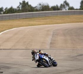 There’s a big bump entering this corner and it’s at the end of the braking zone. Run it in too deep and the ABS works overtime to keep the wheels from locking.
