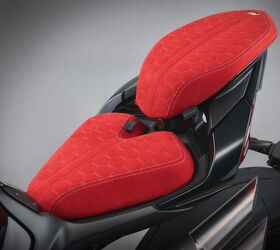 The bespoke rider and pillion seats are upholstered in Alcantara with a honeycomb quilted pattern.
