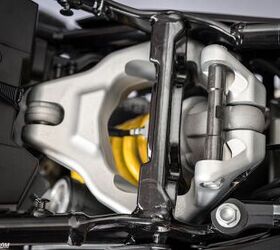 The shock now uses an overhead linkage design compared to the previous shock which was connected directly to the swingarm.