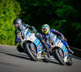 Two film bikes with stunt riders aboard at speed on the TT course, part of the ‘Isle Of Man’ film now in production. No, that’s not Channing Tatum. Photo by Tracey’s Pictures IOM.