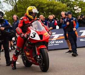 Michael Dunlop astride the beautifully turned out replica of the winning Honda VTR1000 SP-1 ridden by Joey in the 2000 Formula One TT race. Photo by IOM TT Press.