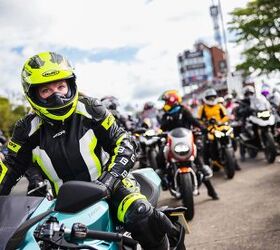 Carolyn Sells at the front of the massive Legacy Lap, with WRWR and the new Norton Manx. Photo by IOM TT Press.