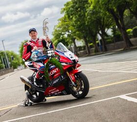 The impressive Dean Harrison with his impressive Superbike trophy. Photo by IOM TT Press.