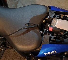 "Simply remove the passenger seat and plug in the battery tender—set it and forget it kinda thing"